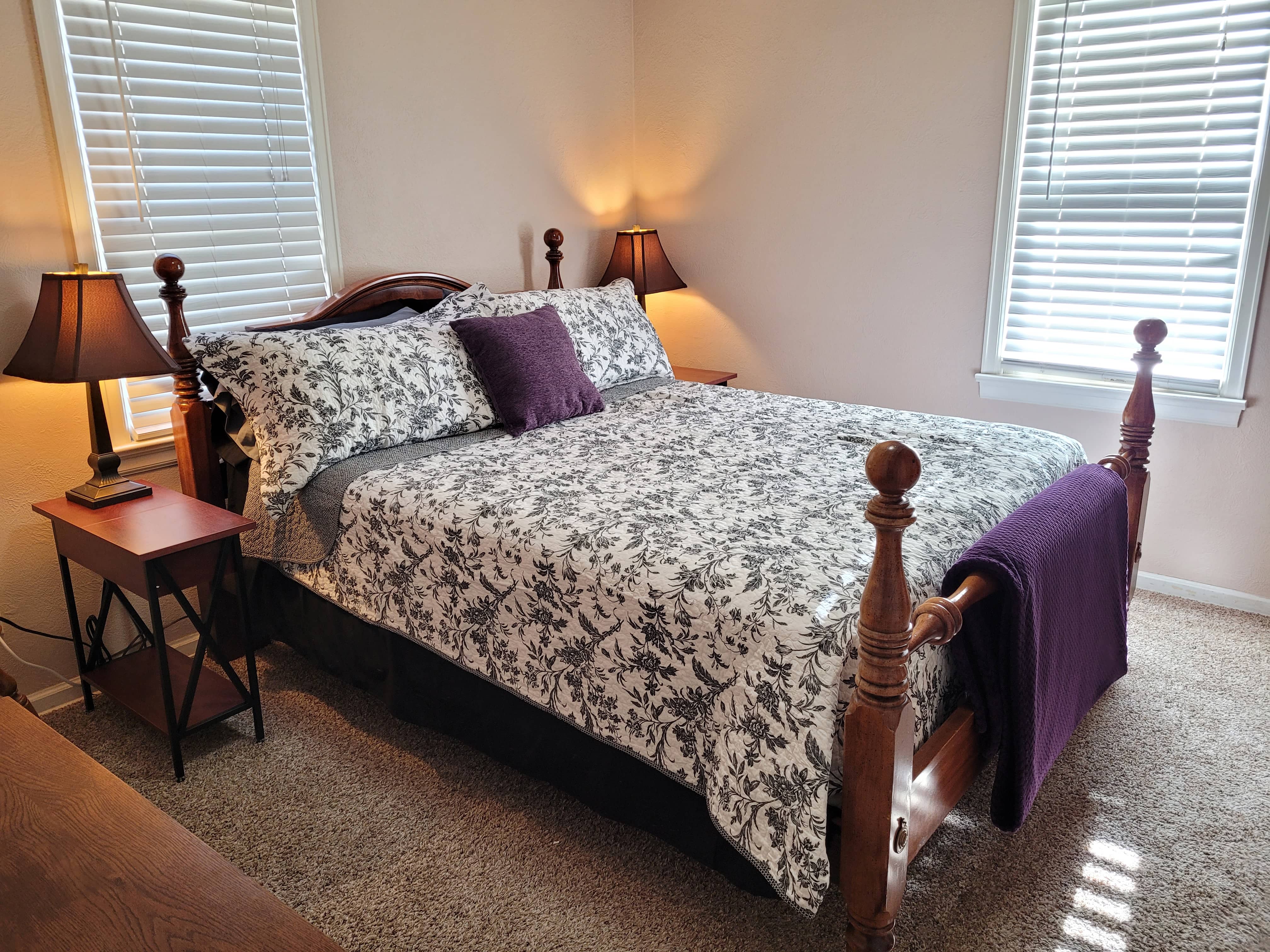 Master bedroom with a luxurious king bed