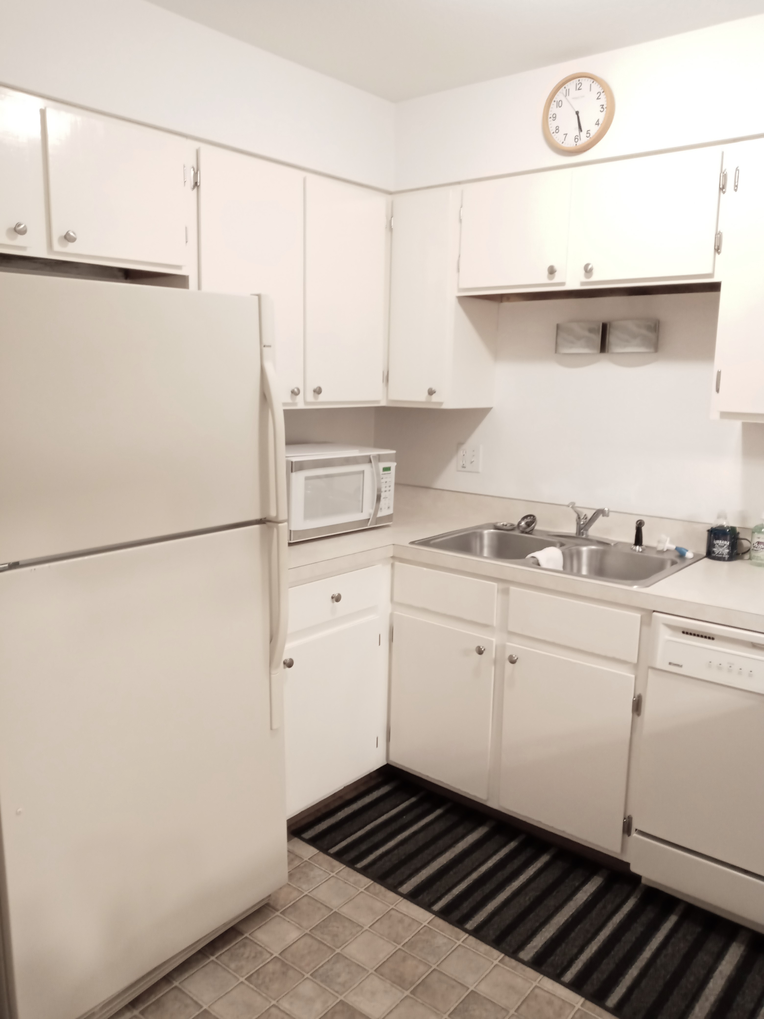 Sleek white kitchen with contemporary appliances