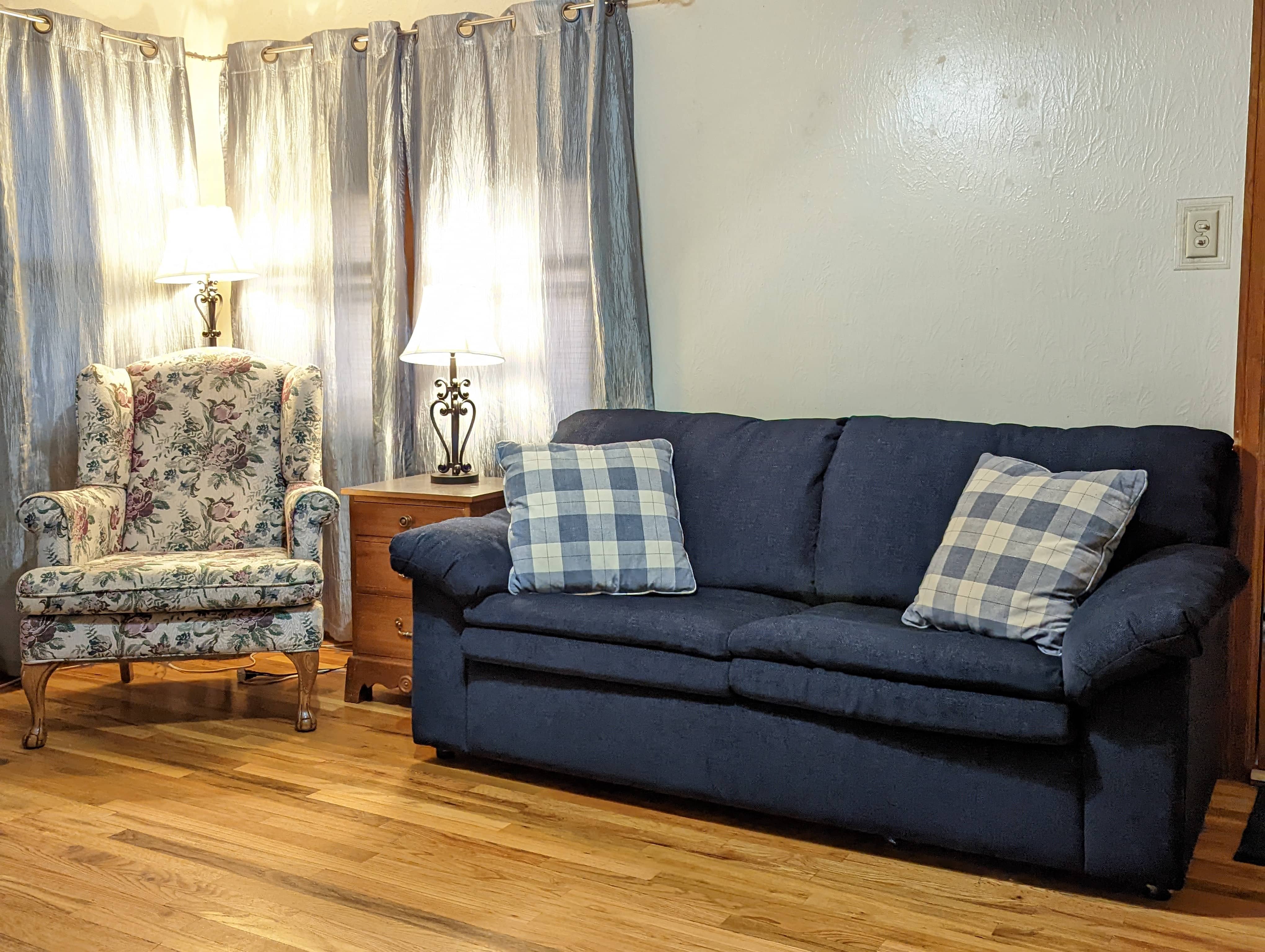 Comfy cloth chair and sofa in living room