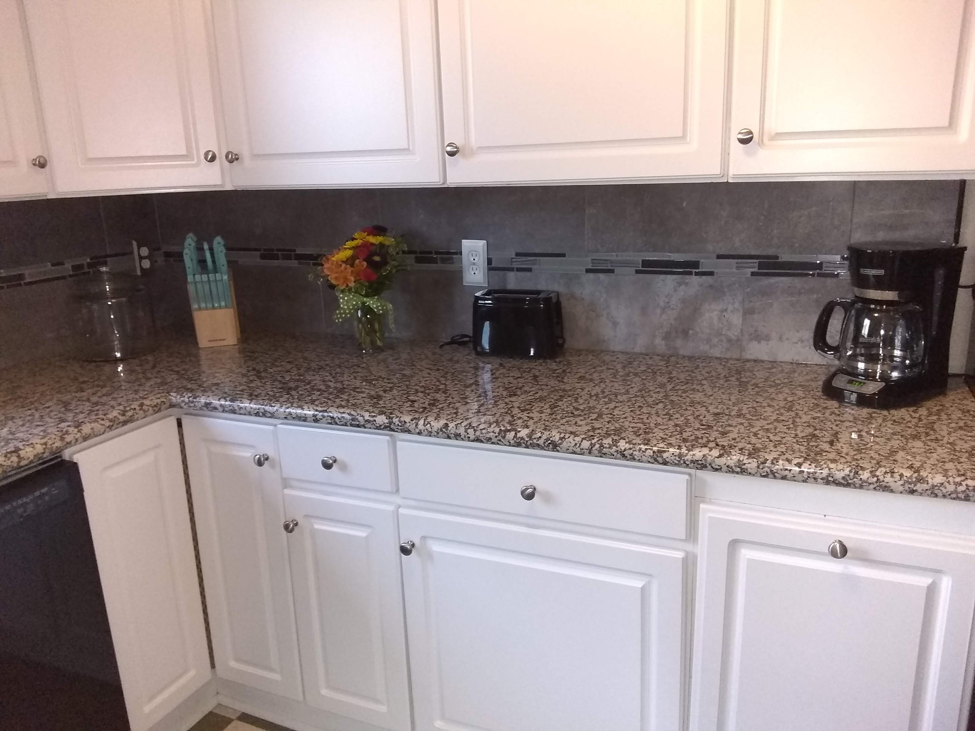 Coffee maker and toaster on marble counters